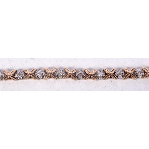 1221 - A LOVELY 9CT GOLD AND DIAMOND BRACELET. 11.4 grams. 18 cm long.