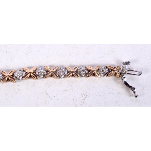 1221 - A LOVELY 9CT GOLD AND DIAMOND BRACELET. 11.4 grams. 18 cm long.