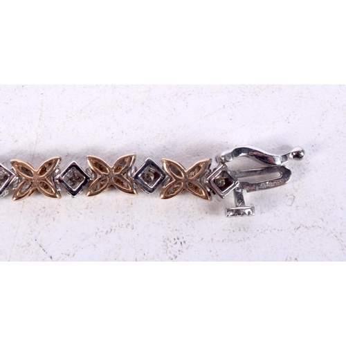 1221 - A LOVELY 9CT GOLD AND DIAMOND BRACELET. 11.4 grams. 18 cm long.