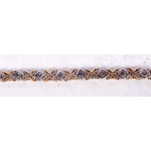 1221 - A LOVELY 9CT GOLD AND DIAMOND BRACELET. 11.4 grams. 18 cm long.