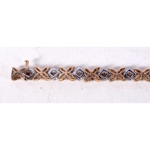 1221 - A LOVELY 9CT GOLD AND DIAMOND BRACELET. 11.4 grams. 18 cm long.