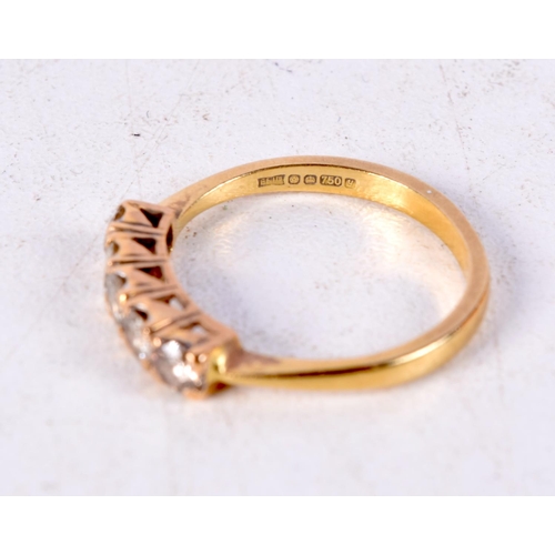 1222 - AN 18CT GOLD AND DIAMOND FIVE STONE RING. O. 2.8 grams.