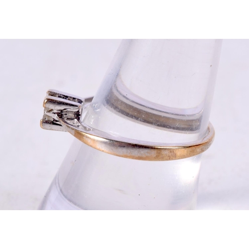 1223 - AN 18CT GOLD AND DIAMOND FOUR STONE RING. O. 2.1 grams.