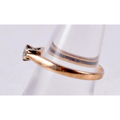 1229 - A 9CT GOLD AND DIAMOND RING. 2 grams. M/N.