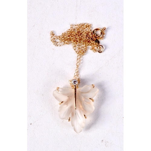 1233 - A 14CT GOLD DIAMOND AND ROCK CRYSTAL PENDANT. 3.2 grams. 44 cm long, pendant 2.25 cm x 2 cm.