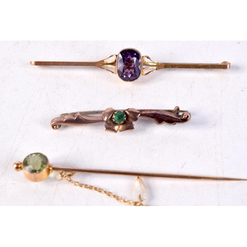 1234 - THREE EDWARDIAN 9CT GOLD BROOCHES. 4 grams. (3)