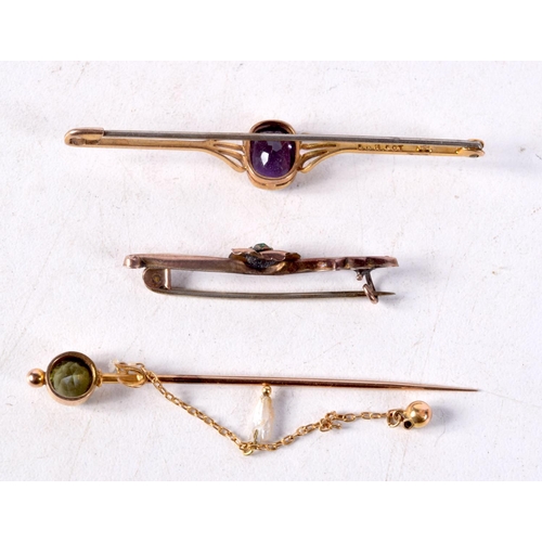 1234 - THREE EDWARDIAN 9CT GOLD BROOCHES. 4 grams. (3)