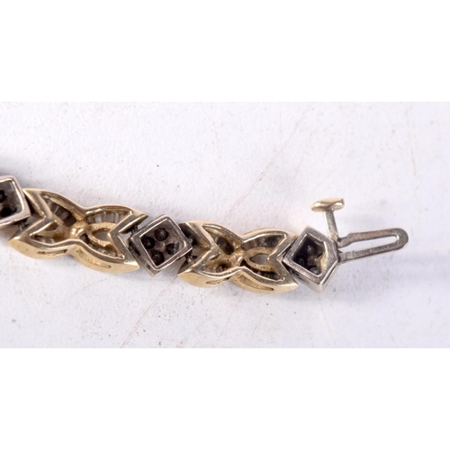 1242 - A 14CT GOLD AND DIAMOND BRACELET. 19 grams. 19 cm long.