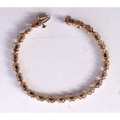 1251 - A GOLD DIAMOND AND SAPPHIRE BRACELET. 9.2 grams. 18.5 cm long.