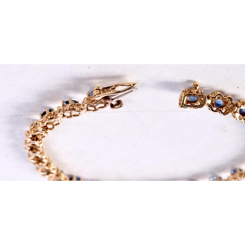 1251 - A GOLD DIAMOND AND SAPPHIRE BRACELET. 9.2 grams. 18.5 cm long.