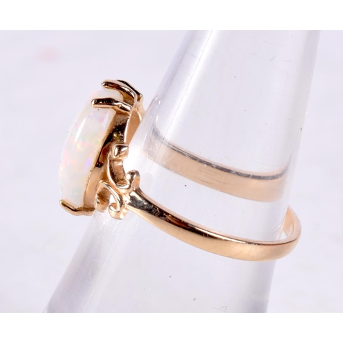 1253 - A 14CT GOLD AND OPAL RING. 2.5 grams. L.