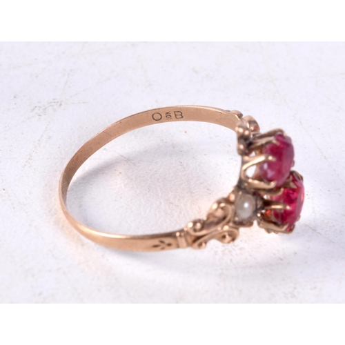 1255 - A 10CT GOLD AND RUBY RING. 1.6 grams. P.