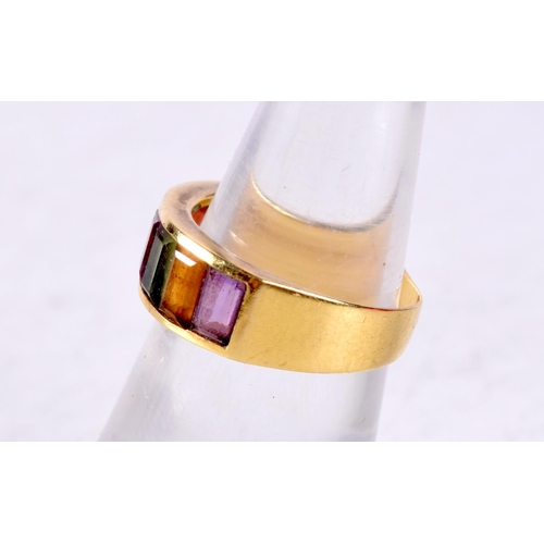 1256 - A 9CT GOLD MULTI STONE RING. J. 3.6 grams.