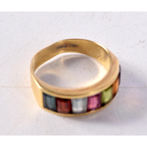 1256 - A 9CT GOLD MULTI STONE RING. J. 3.6 grams.