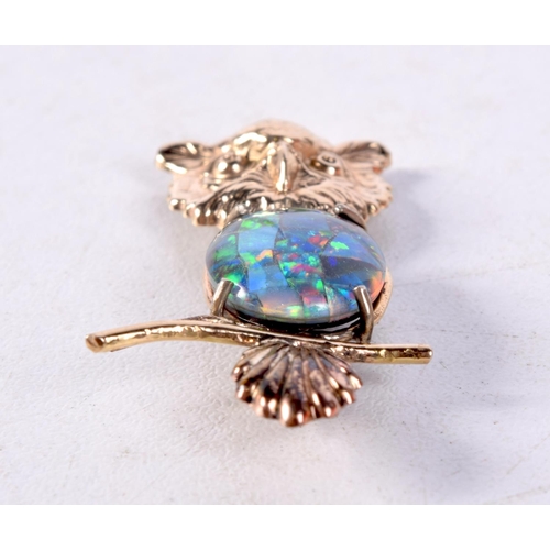 1257 - A GOLD AND OPAL OWL BROOCH. 4.1 grams. 4 cm x 2 cm.