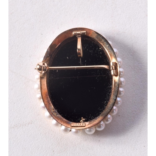 1259 - A 14CT GOLD CAMEO STONE PEARL BROOCH. 5.2 grams. 3 cm x 2.5 cm.