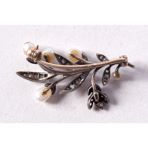 1267 - A ROSE GOLD DIAMOND AND PEARL BROOCH. 4 grams. 4.25 cm x 1.75 cm.