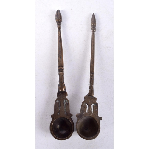 1304 - THREE 19TH CENTURY MIDDLE EASTERN ALLOY SPOONS. 15.5 cm x 2.5 cm. (3)