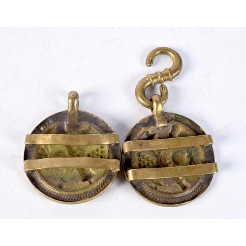 1311 - A PAIR OF ANTIQUE BRASS MILITARY BADGES. 4.5 cm wide.