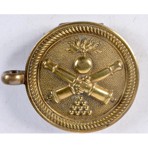 1311 - A PAIR OF ANTIQUE BRASS MILITARY BADGES. 4.5 cm wide.