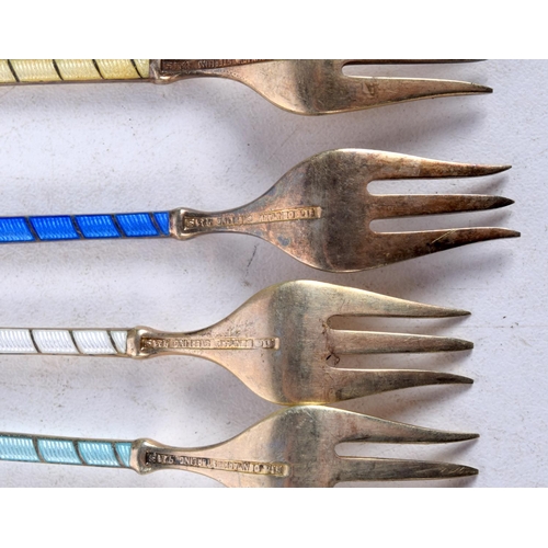 1316 - SIX VINTAGE DANISH SILVER AND ENAMEL FORKS. 81 grams. 12 cm long. (6)