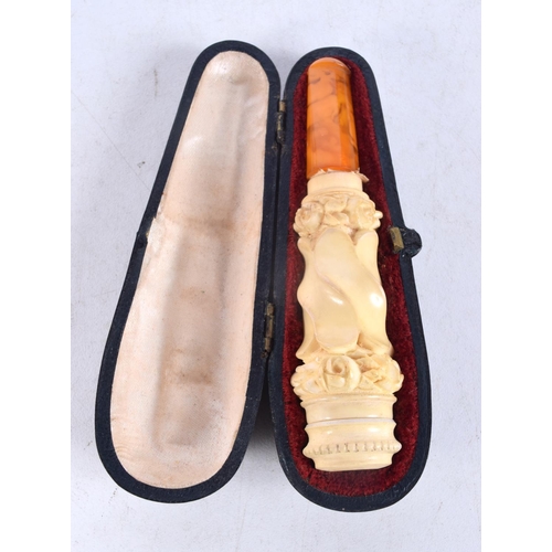 1317 - TWO CASED CHEROOT PIPES. Largest 9 cm x 2.5 cm. (2)