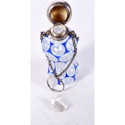 1340 - A VICTORIAN SILVER MOUNTED BLUE OVERLAID GLASS SCENT BOTTLE. 58 grams. 7.5 cm x 3 cm.