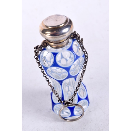 1340 - A VICTORIAN SILVER MOUNTED BLUE OVERLAID GLASS SCENT BOTTLE. 58 grams. 7.5 cm x 3 cm.