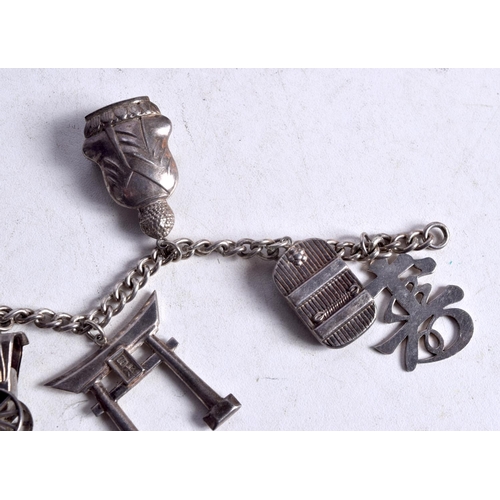 1344 - A SILVER CHARM BRACELET. 48 grams. 19 cm long.