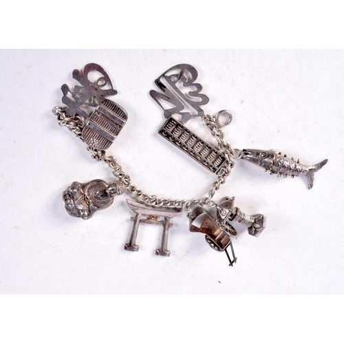 1344 - A SILVER CHARM BRACELET. 48 grams. 19 cm long.