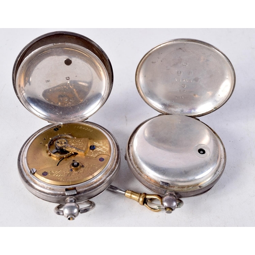 1352 - TWO VICTORIAN SILVER POCKET WATCHES. 239 grams. Birmingham 1872 & 1883. 5.25 cm diameter. (2)