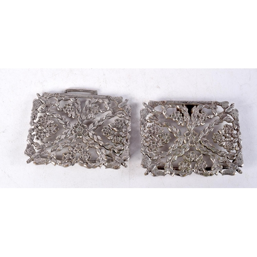 1353 - THREE ANTIQUE WHITE METAL BELT BUCKLES. 128 grams. Largest 10 cm x 5.5 cm. (3)