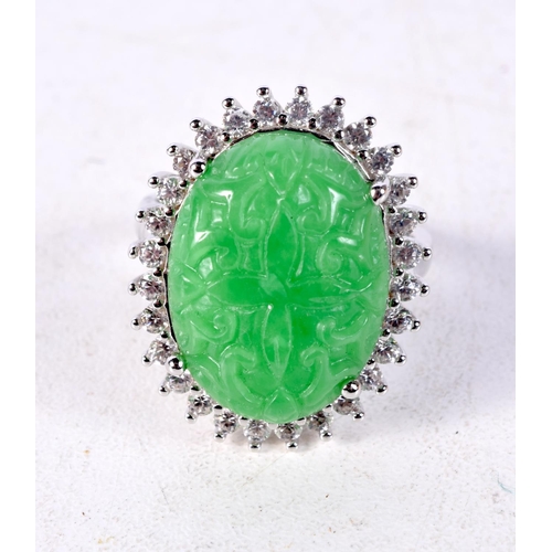 1355 - A CHINESE SILVER AND JADE RING. 9.2 grams. Q/R.