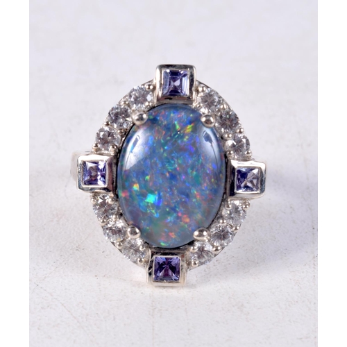 1356 - A SILVER AND OPAL RING. 7.5 grams. R/S.