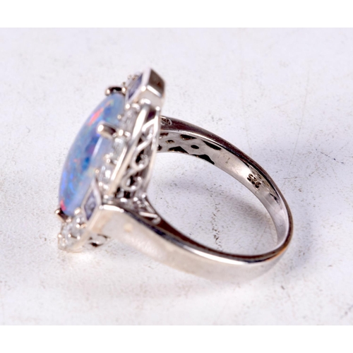 1356 - A SILVER AND OPAL RING. 7.5 grams. R/S.