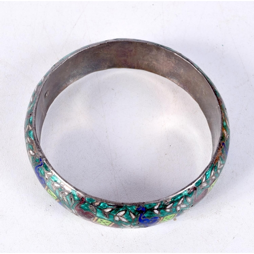 1364 - A VINTAGE INDIAN SILVER AND ENAMEL BANGLE. 26 grams. 6 cm diameter.