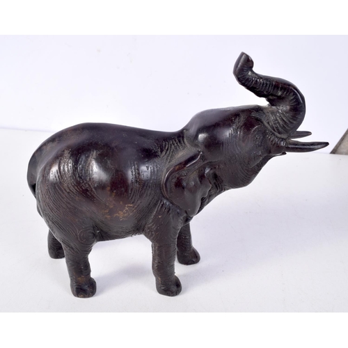 1386 - A BRONZE ELEPHANT. 18 cm x 16 cm.