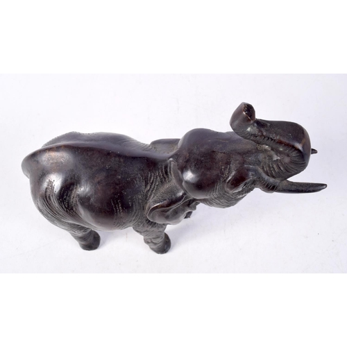 1386 - A BRONZE ELEPHANT. 18 cm x 16 cm.