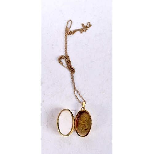 1393 - A 9CT GOLD LOCKET. 3.6 grams. 48 cm long, pendant 3 cm x 1.5 cm.