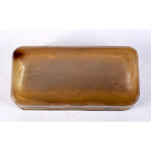 1414 - AN ANTIQUE HORN SNUFF BOX. 6.25 cm x 3 cm.