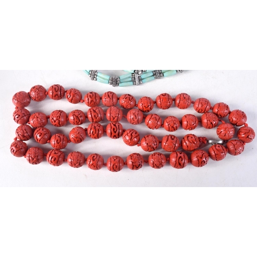 1421A - TWO CHINESE NECKLACES. Longest 83 cm long. (2)