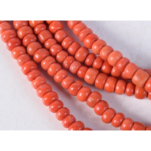 1422D - AN 18CT GOLD AND CORAL NECKLACE. 312 grams. 43 cm long.