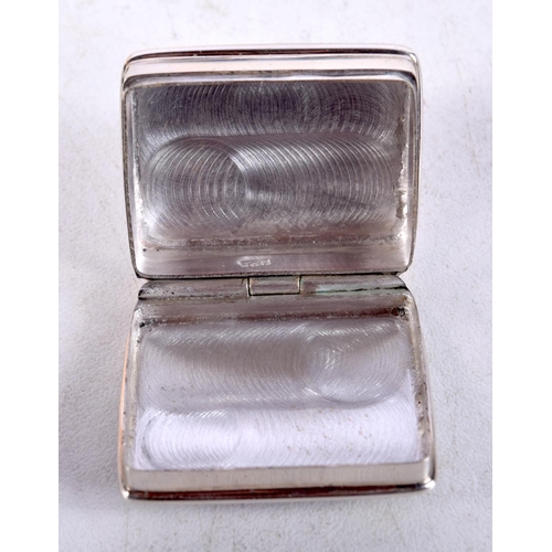 1424 - A SILVER RUGBY PILL BOX. 21 grams. 3.25 cm x 2.5 cm.