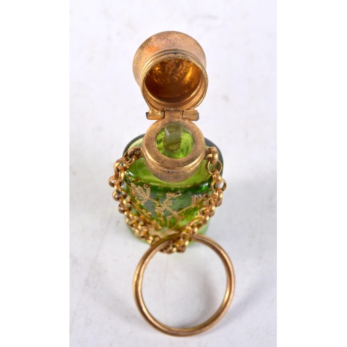 1424A - A VINTAGE GLASS SCENT BOTTLE. 5 cm x 1.75 cm.