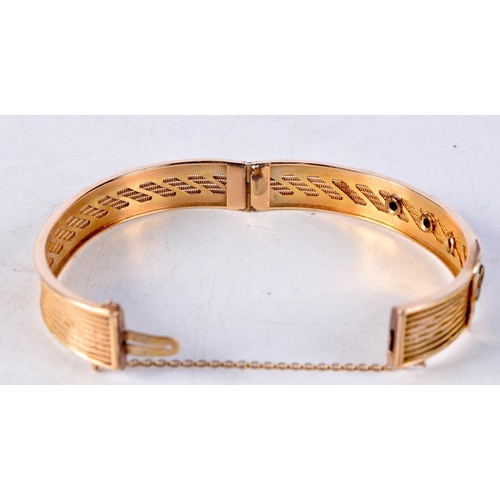 1426C - AN ANTIQUE YELLOW METAL AND DIAMOND BANGLE. 18.5 grams. 6 cm wide.