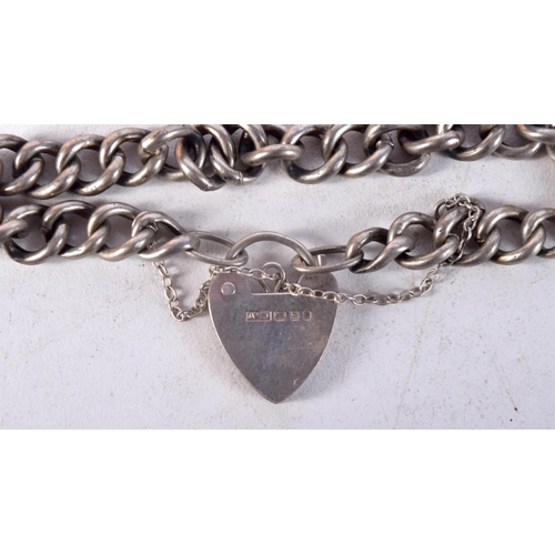 1428D - A SILVER CHARM BRACELET. 6.7 grams. 13.5 cm long.