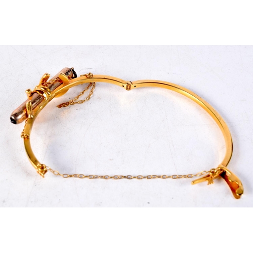 1431D - A 9CT GOLD BANGLE. 15.4 grams. 5.5 cm x 4.5 cm.