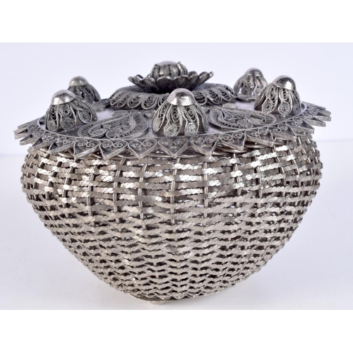 1432 - AN UNUSUAL EARLY 20TH CENTURY MIDDLE EASTERN WHITE METAL FILIGREE COVER upon an Albanian basket. 690... 