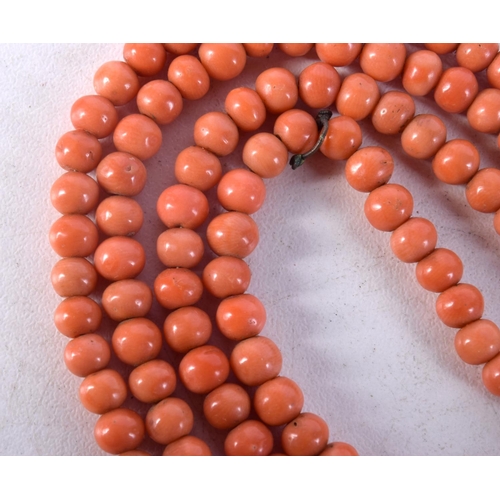 1434C - A CORAL NECKLACE. 138 cm long.