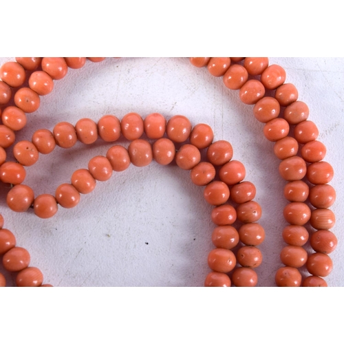 1434C - A CORAL NECKLACE. 138 cm long.